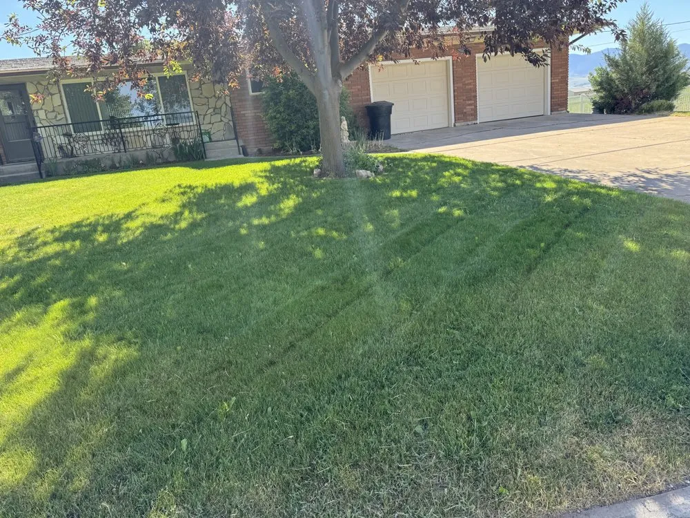 Affordable yard maintenance with custom design across Smithfield, UT - Stevie’s Lawn Care
