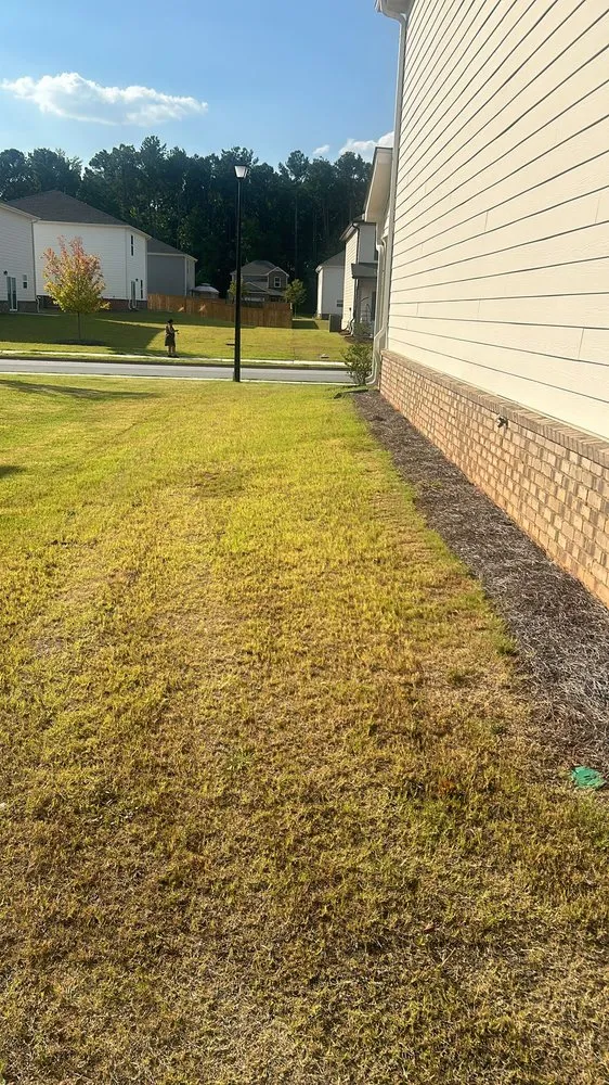 Custom landscape design in Lilburn, GA by Sthely Landscaping