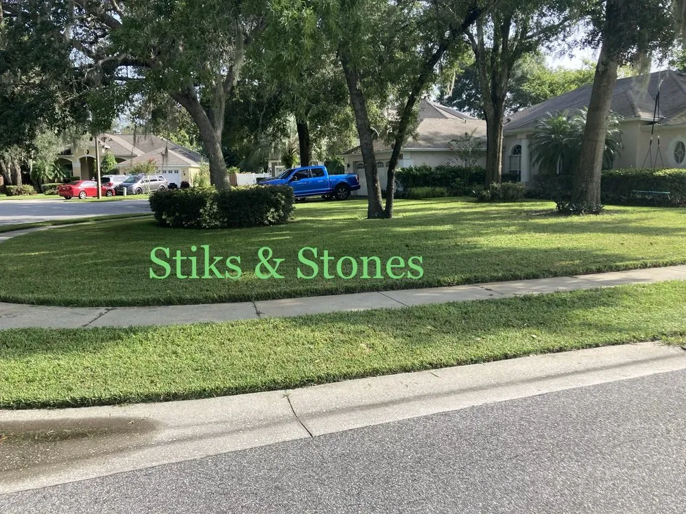 Trusted lawn mowing service near you in Orlando, FL by Stiks And Stones