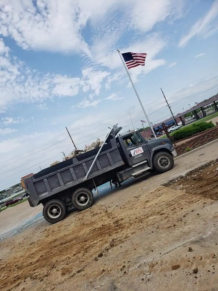 Professional yard cleanup service in Fenton, MO by STL Concrete And Landscaping