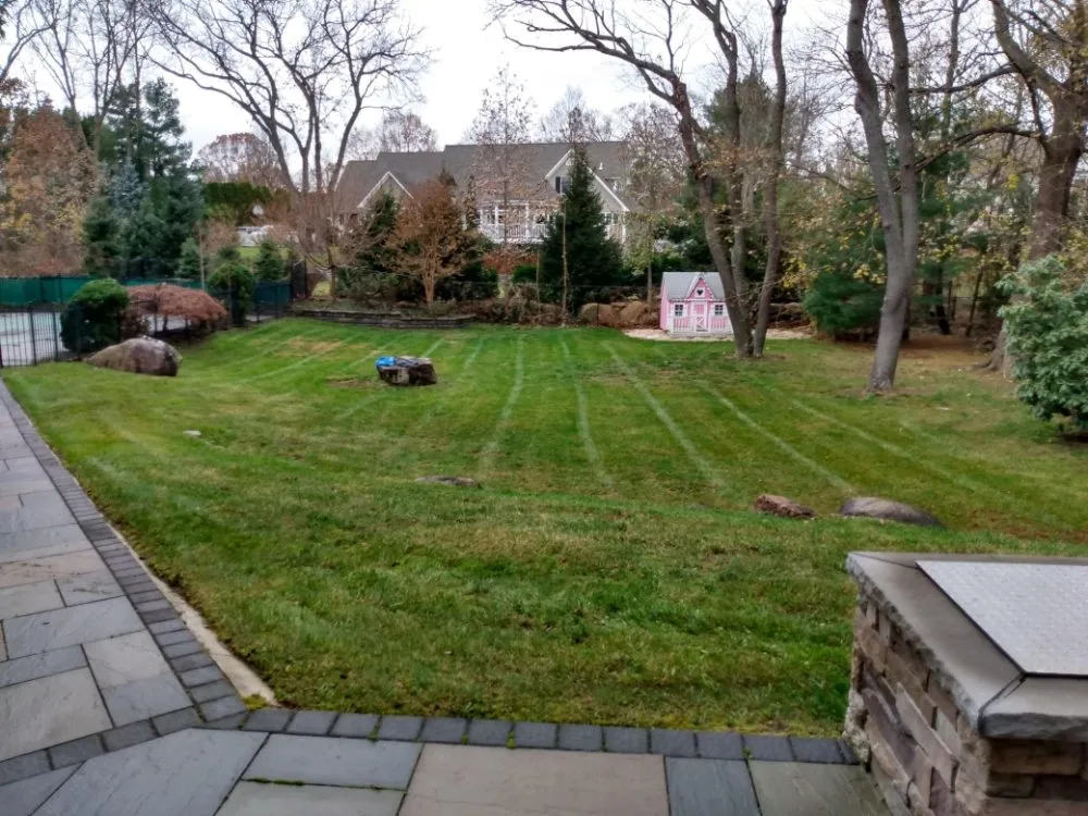 Custom outdoor landscaping with custom design across wading river, NY - Stokleys Lawncare