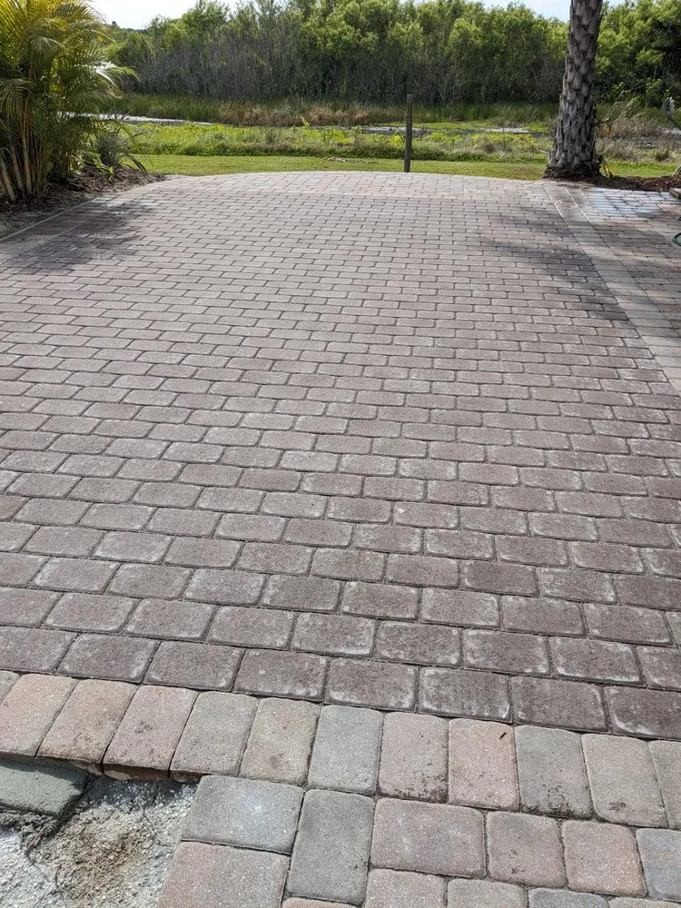 Expert lawn mowing service for year-round maintenance in Okeechobee, FL by Stone Craft