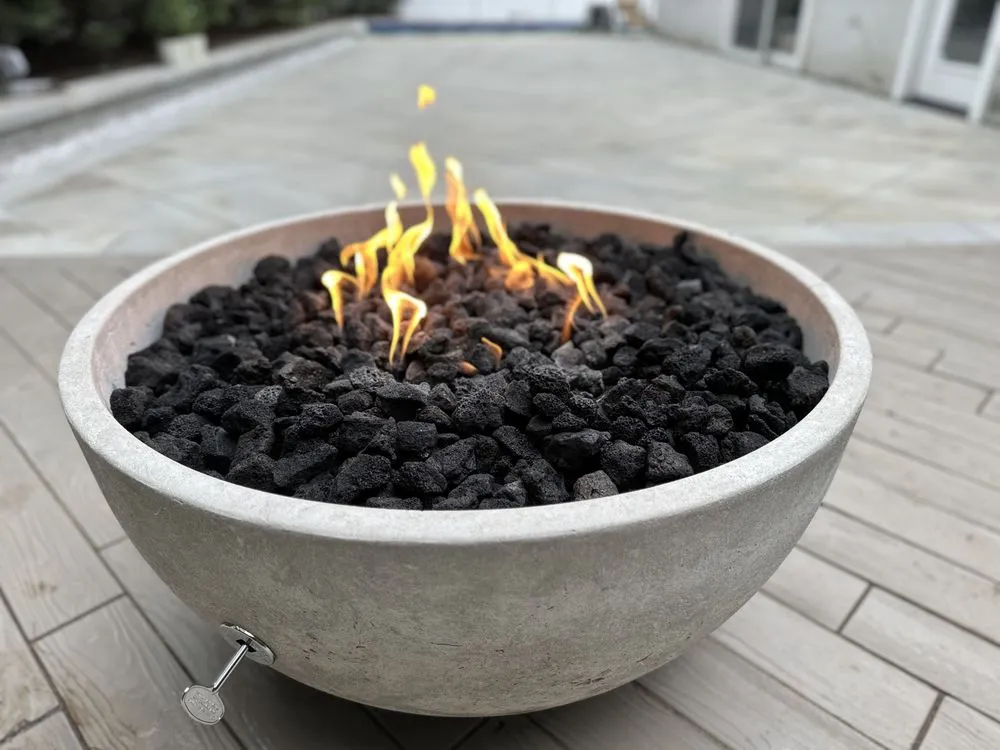 Local landscape installation for year-round maintenance in Deer Park, NY by Stone Creations of Long Island Pavers & Masonry