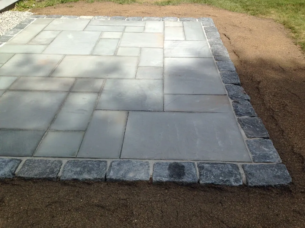 Local lawn care service for year-round maintenance in Kingston, NH by Stone Elements