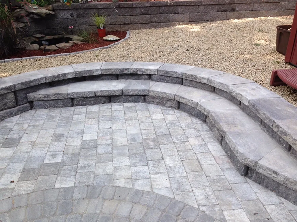 Professional yard cleanup service with custom design across Kingston, NH - Stone Elements