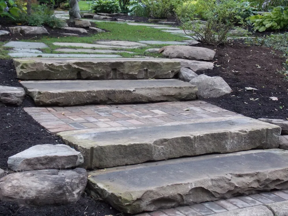 Trusted yard cleanup service for residential properties in Garrettsville, OH by Stone Ledge Designs