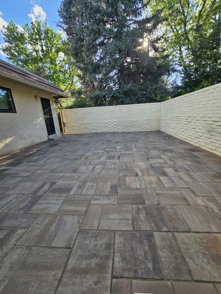 Expert lawn mowing service for year-round maintenance in Thornton, CO by Stone Peak Landscape and Design