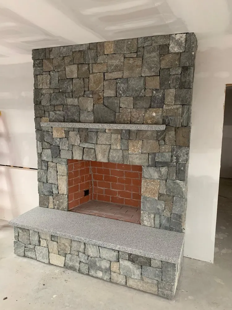 Local yard cleanup service for residential properties in Saco, ME by Stone Solutions Maine