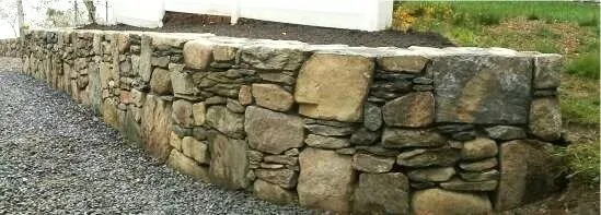 Reliable landscape installation in Stow, MA by Stone Wall Designers