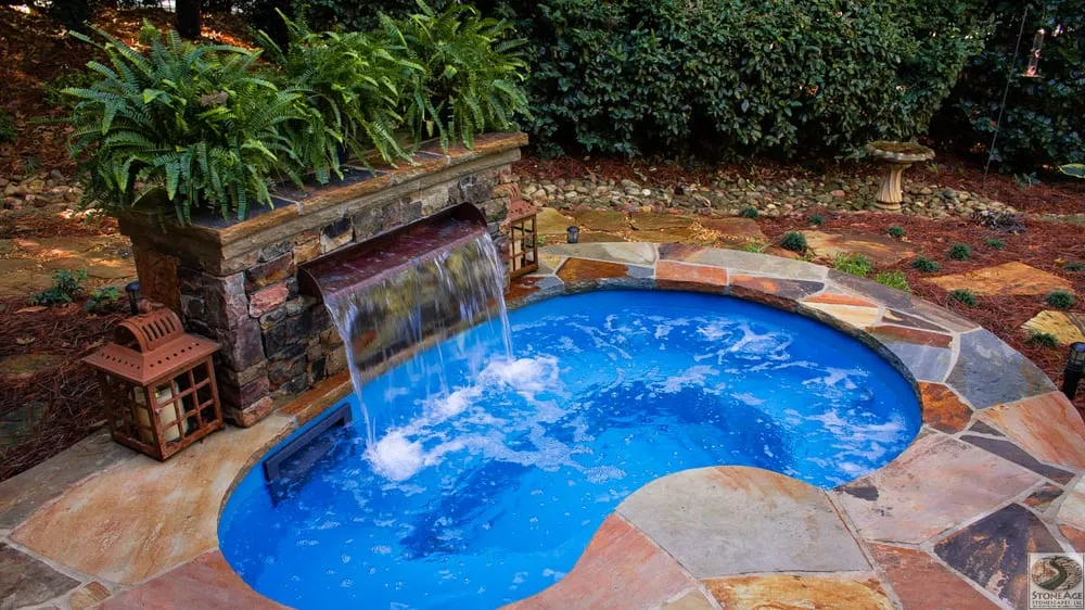 Custom landscape installation for residential properties in Cumming, GA by StoneAge Stonescapes