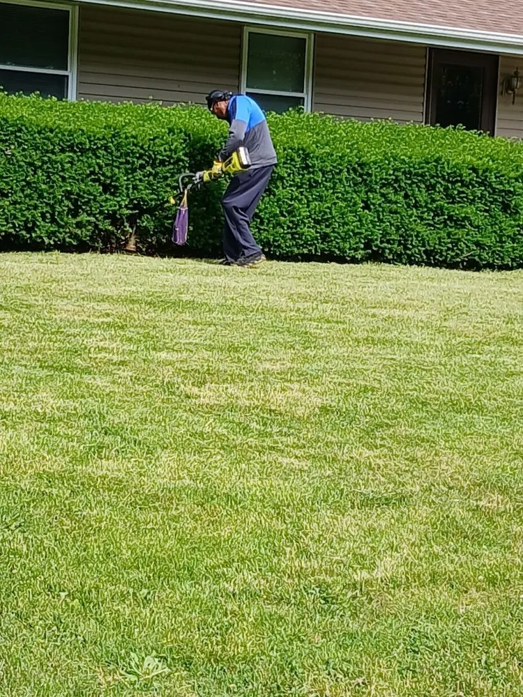 Custom landscape design in Ofallon, IL by Stone's Interior Painting and Flooring