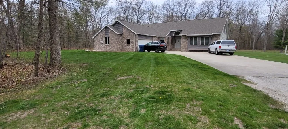 Professional landscape installation for beautiful yards across Muskegon, MI - Straight Egde