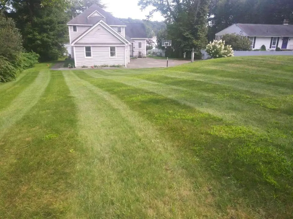 Professional lawn mowing service in Methuen, MA - Straight Line Landscaping