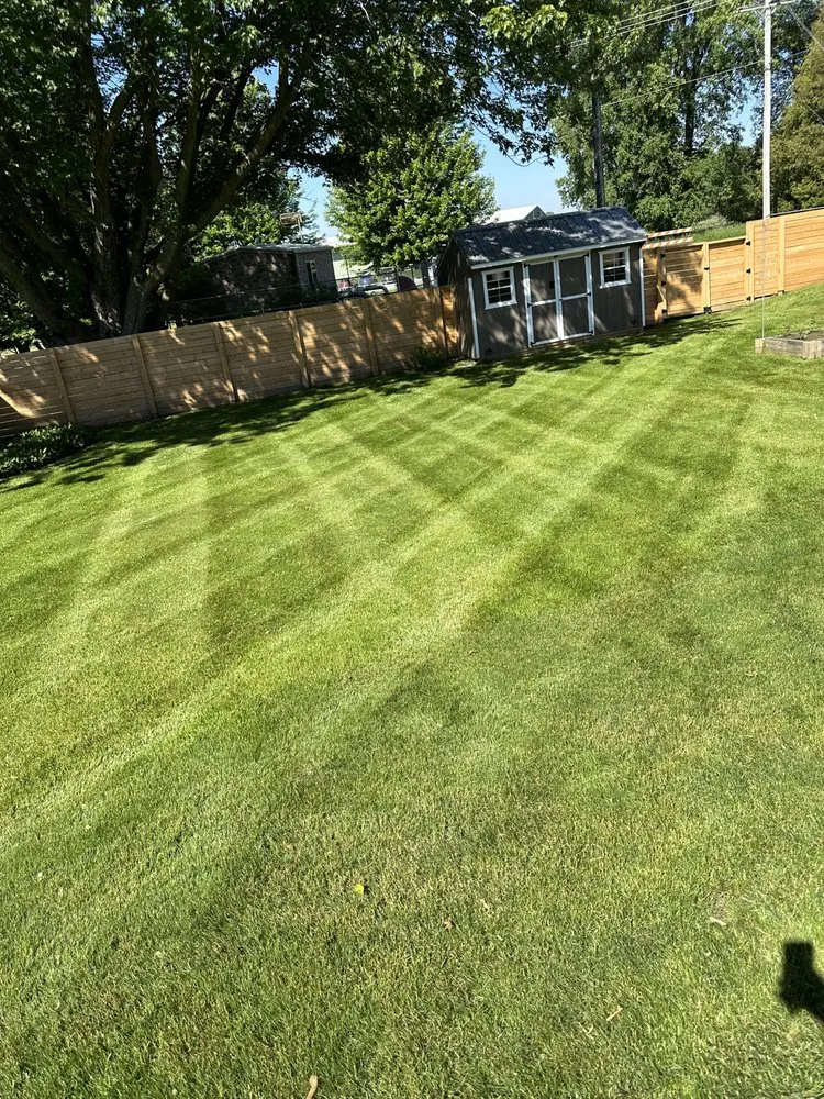 Expert yard maintenance for outdoor upgrades in Two Rivers, WI by Straight Line