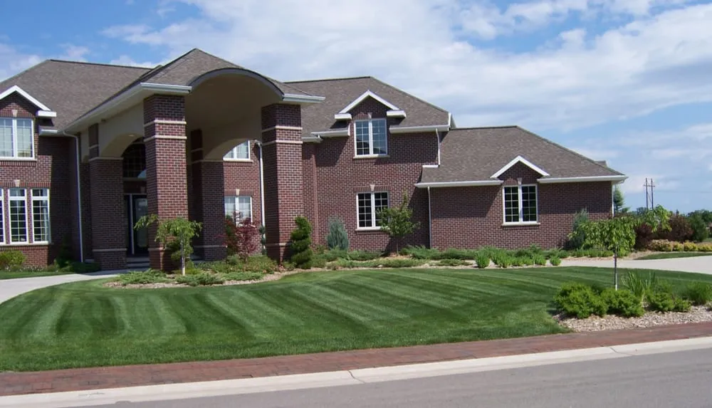 Expert landscape design in De Pere, WI by Straw Hat Lawn & Landscape