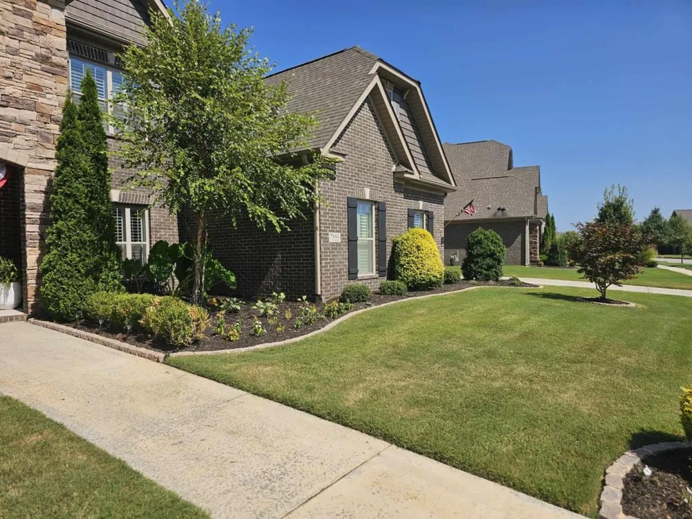 Professional yard cleanup service in Huntsville, AL by Straw Hat Lawn Service