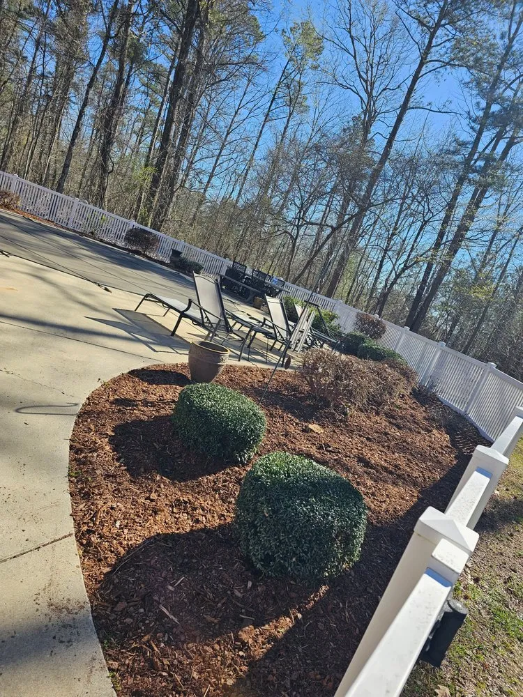 Custom lawn mowing service for year-round maintenance in Huntsville, AL by Straw Hat Lawn Service