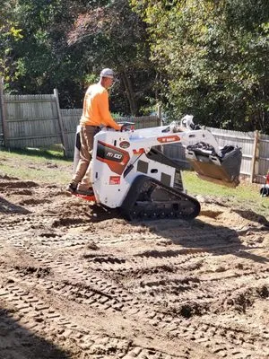 Strickland Lawn Care & Construction Services Logo