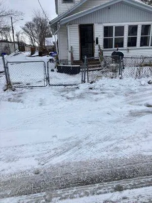 Strickland Lawn Care Logo