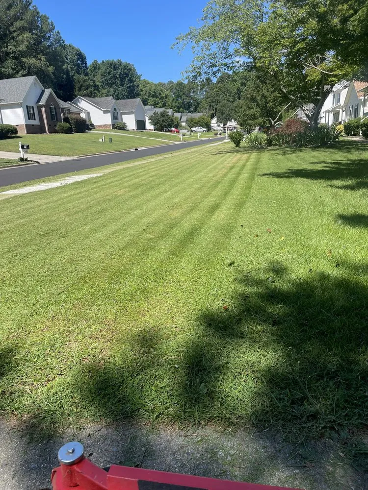 Expert outdoor landscaping with custom design in Clayton, NC by Strickland’s Lawncare