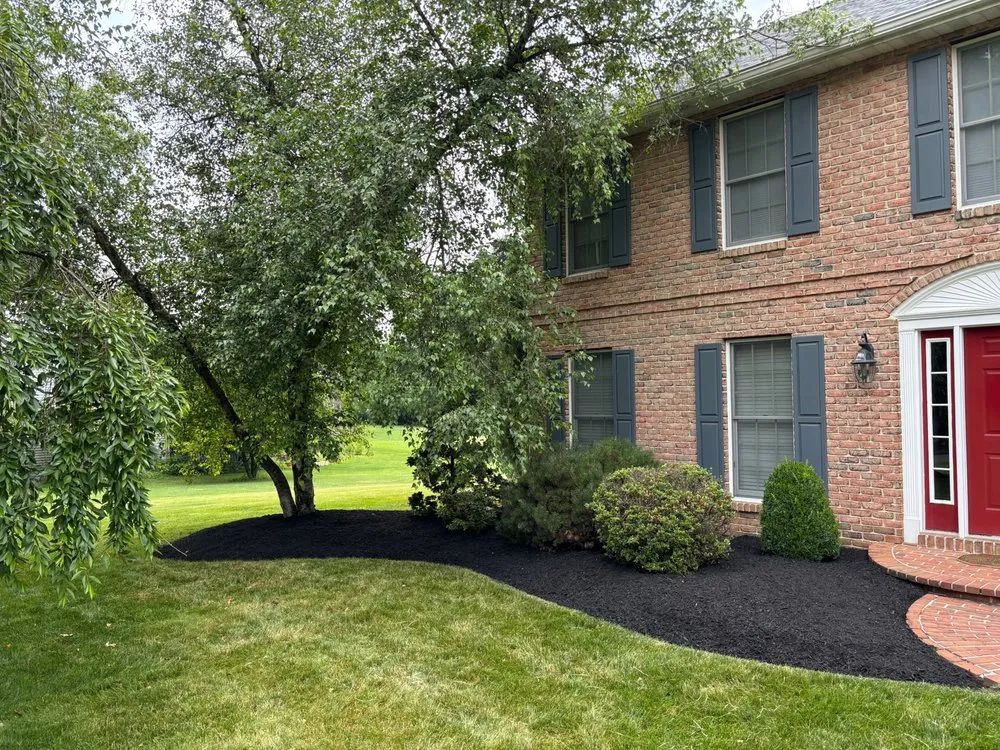 Custom yard cleanup service with custom design across Reading, PA - Stripe It Up Landscaping
