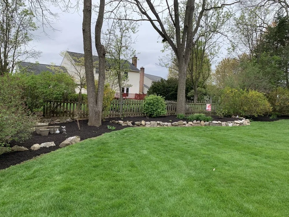 Custom landscape design for residential properties in Reading, PA by Stripe It Up Landscaping