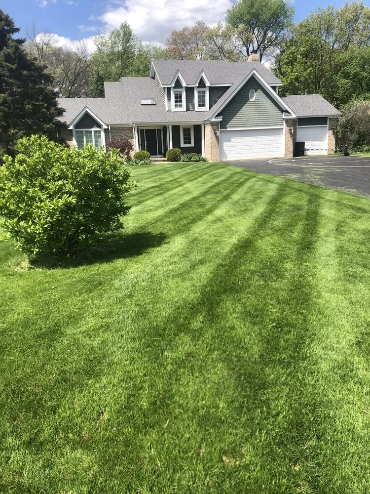 Custom garden landscaping with custom design in Marengo, IL by Stripe Nation Lawn Care