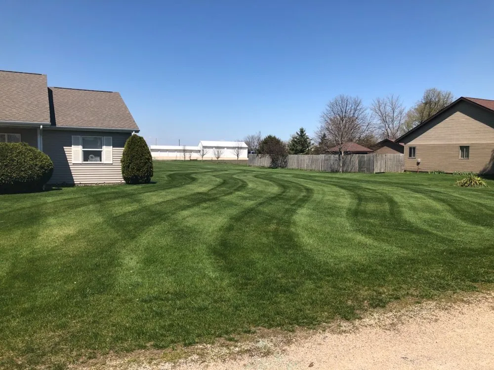 Reliable lawn care service for outdoor upgrades in Stanwood, IA by StripeDesign Pro Look Lawns