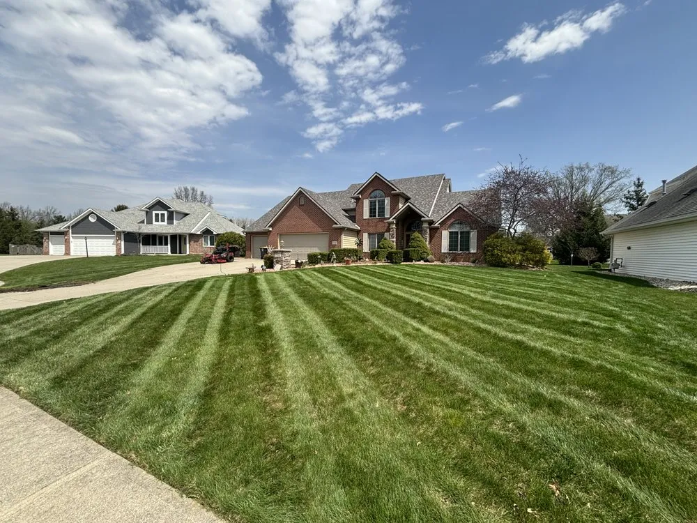 Professional landscape installation for homes in Fort Wayne, IN by Stripes Lawn Services