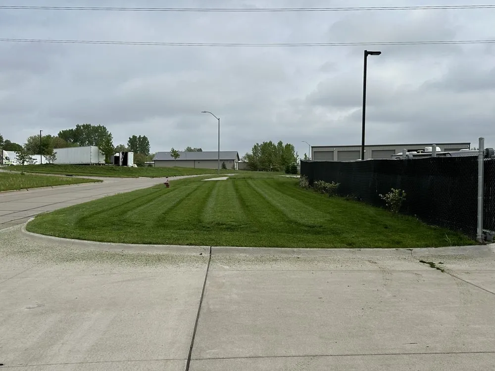 Custom landscape design for year-round maintenance across Grimes, IA - Stripez Site Management