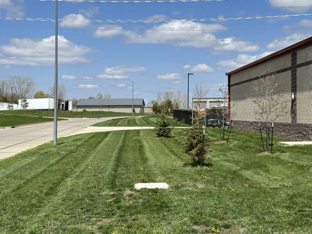 Professional outdoor landscaping for residential properties across Grimes, IA - Stripez Site Management