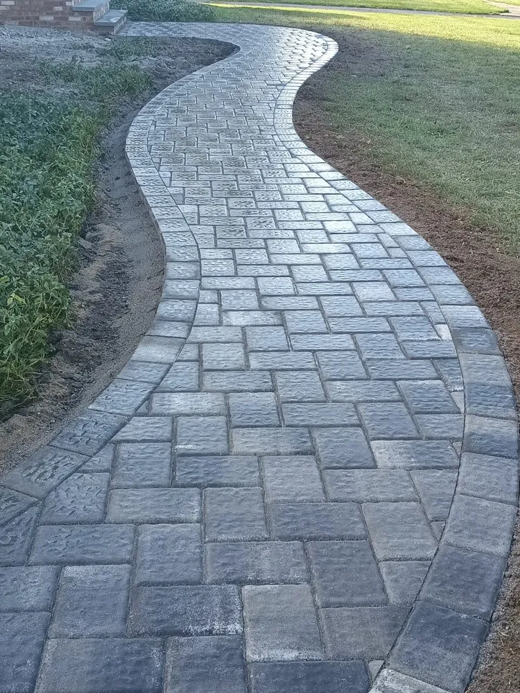 Top-rated lawn mowing service for beautiful yards in New Brunswick, NJ by Strong Arm Hardscape