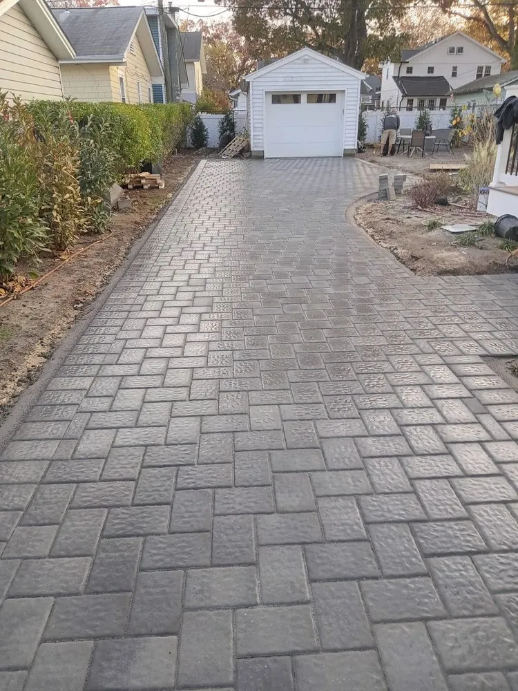 Top-rated lawn mowing service for residential properties in New Brunswick, NJ by Strong Arm Hardscape