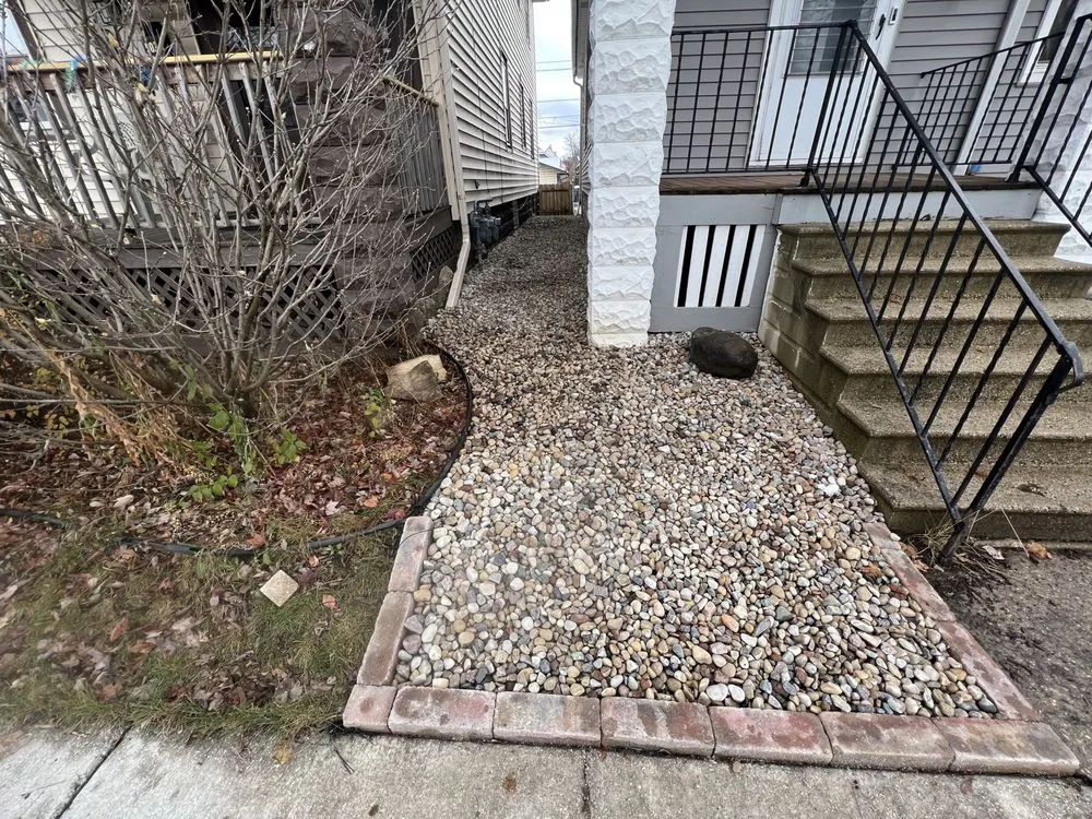 Professional lawn mowing service for residential properties across Wauwatosa, WI - Strong Arm Services