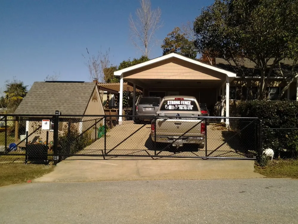 Professional lawn mowing service for outdoor upgrades in Columbus, GA by Strong Fence , Landscaping & Decks