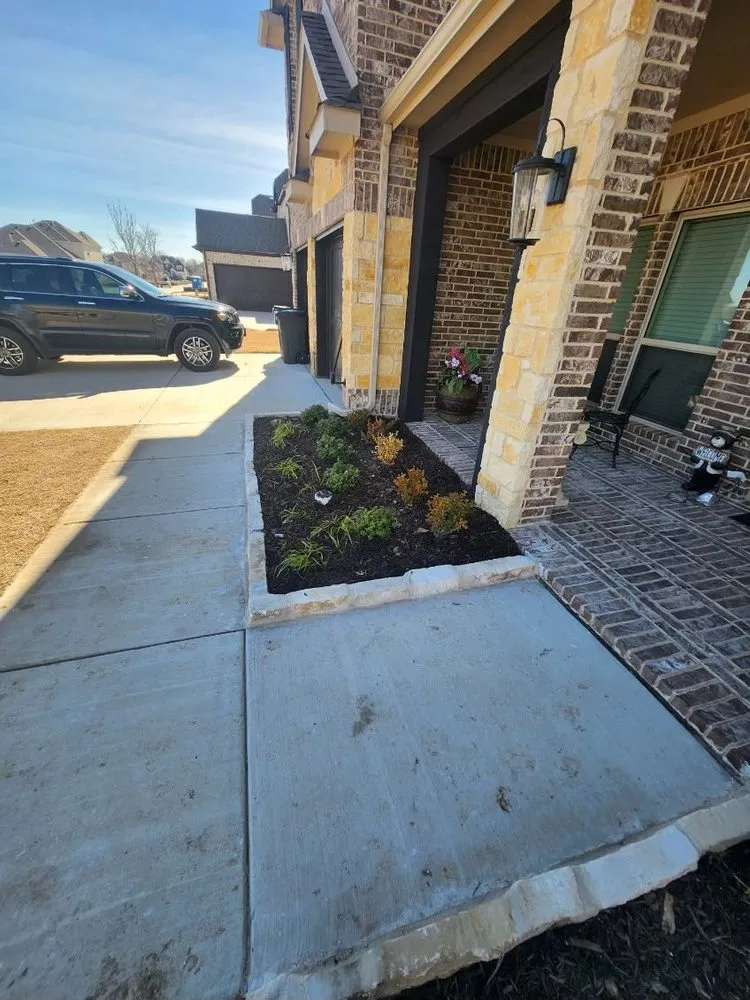 Custom lawn mowing service for outdoor upgrades in Forney, TX by Strong Roots Landscaping