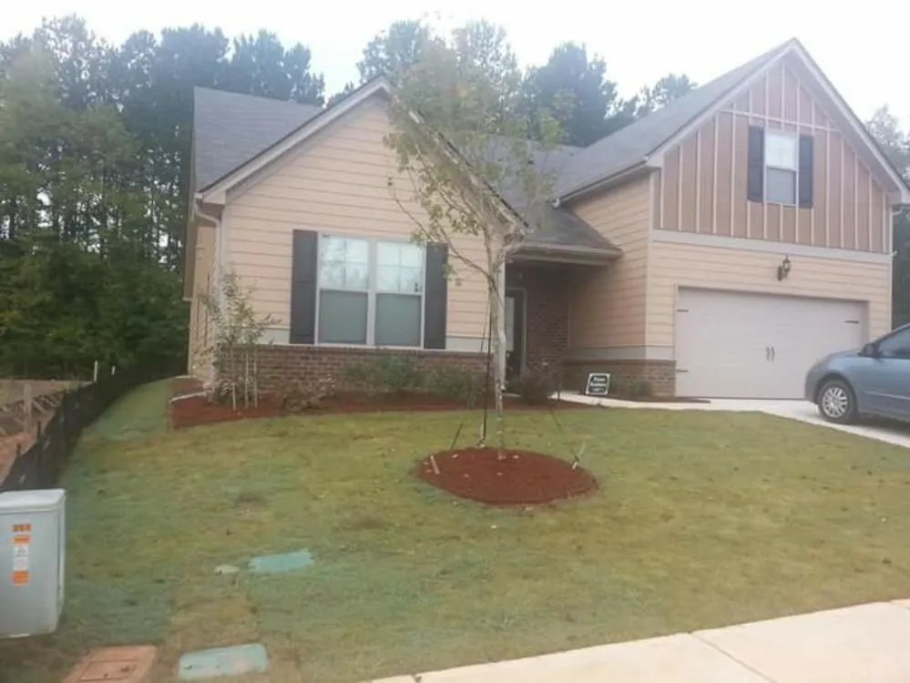 Expert landscaping services with custom design in Newnan, GA by Strozier Lawn Care Services