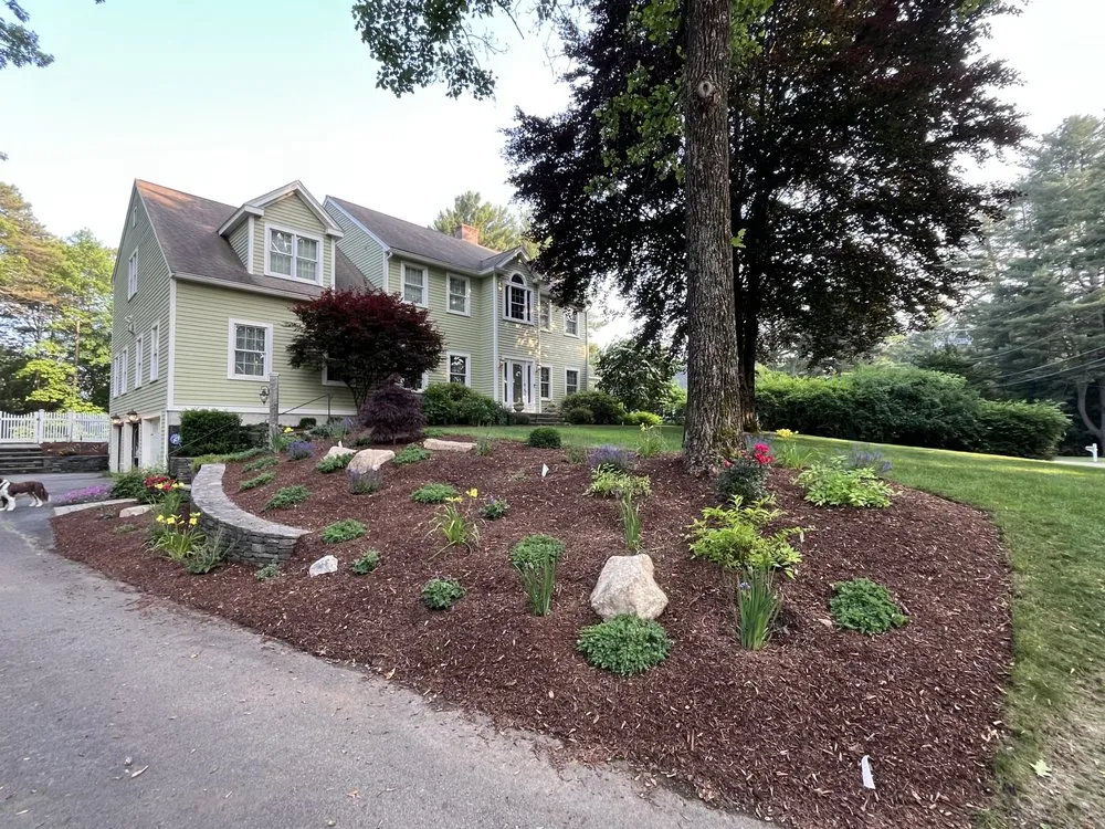 Custom lawn mowing service with custom design across Holliston, MA - Stucchi Landscape & Design