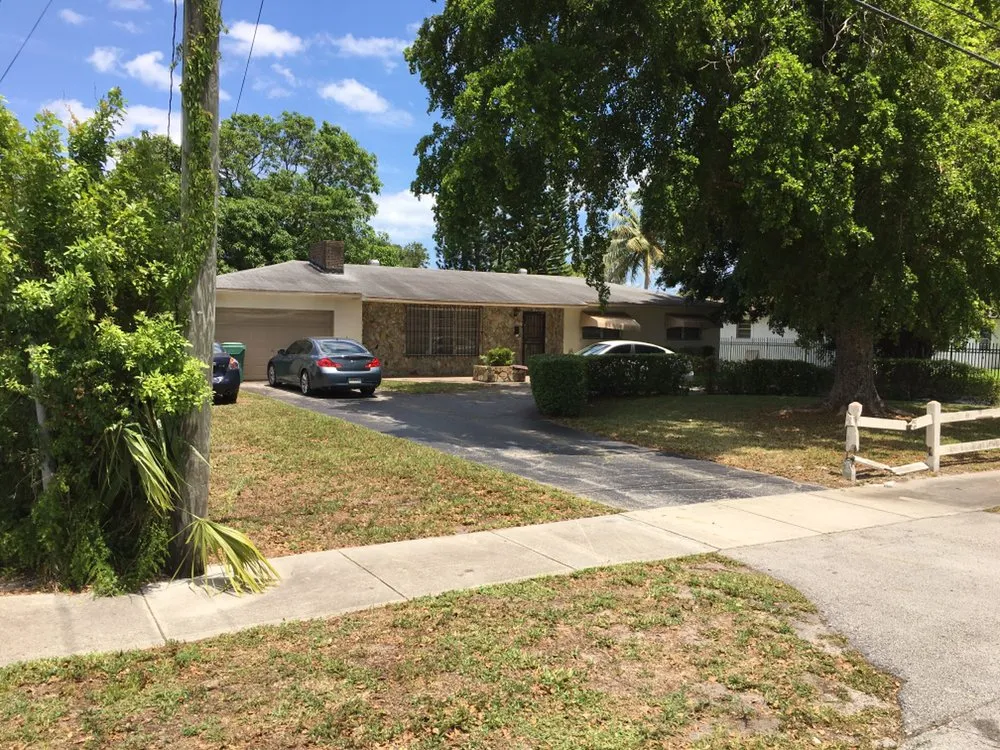 Expert outdoor landscaping with custom design in Miami, FL by Stuckey Lawn and Maintenance