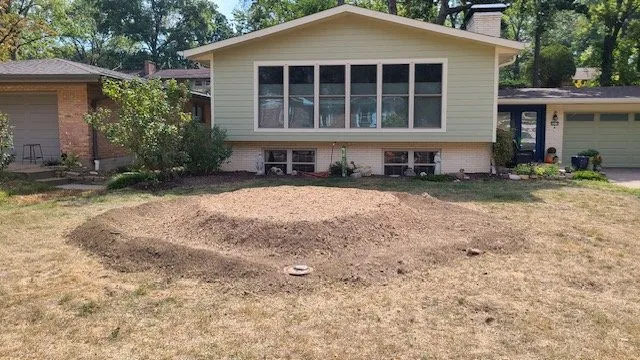 Custom landscape installation with custom design across St Charles, MO - Stump Erasers