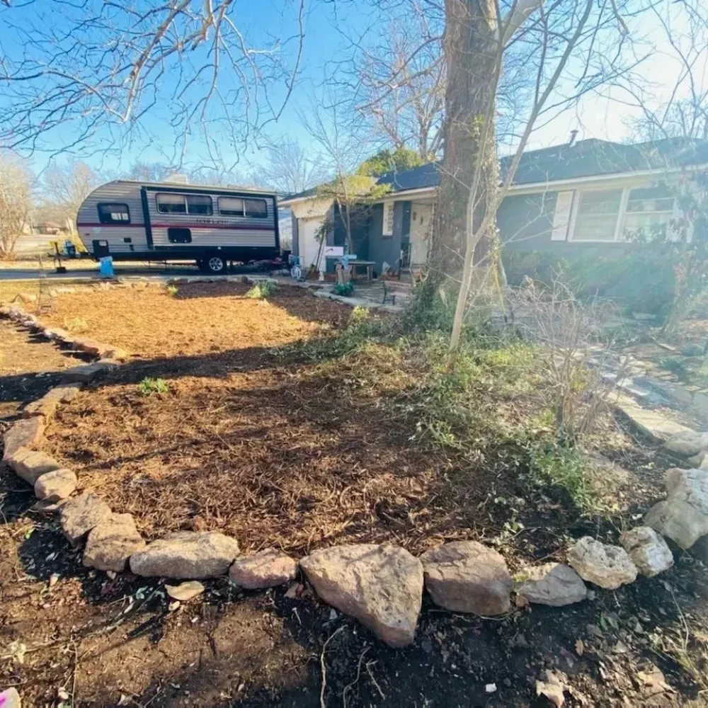 Professional yard cleanup service with custom design in Norman, OK by Stunnin Greens
