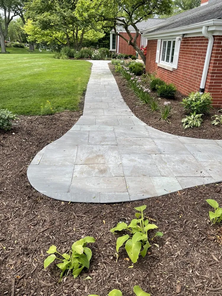 Trusted yard maintenance for residential properties in Elburn, IL by Suburban Lawn