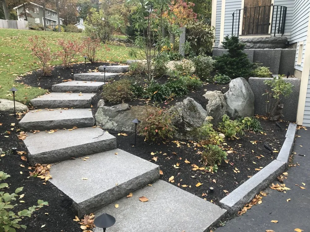 Affordable yard cleanup service for residential properties in Hudson, MA by Sudbury Stone & Hardscape