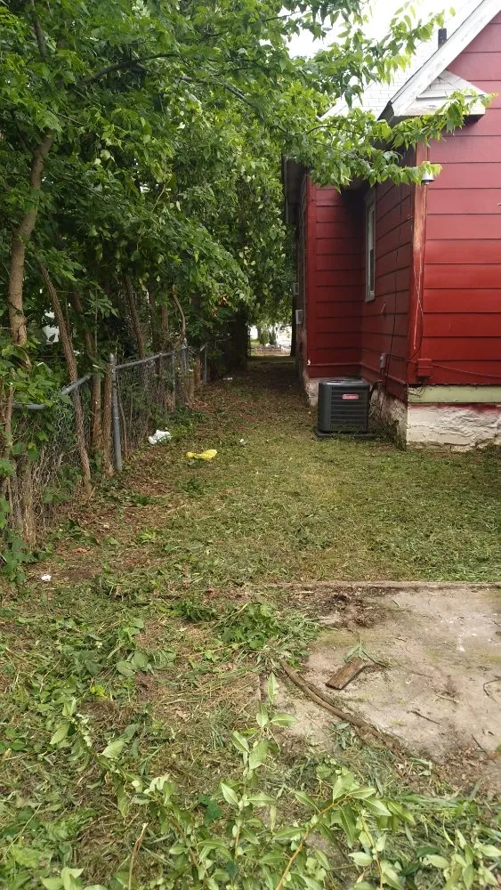 Custom landscape installation in Joplin, MO - Sue & Joe's Family Mowing