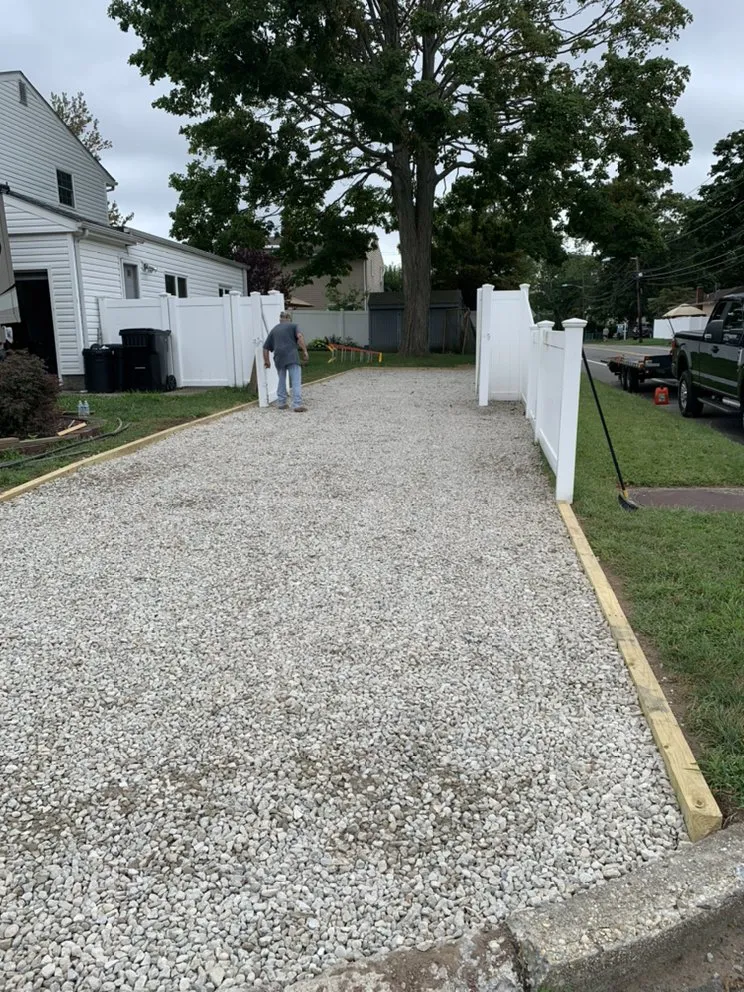 Affordable yard maintenance for homes in Ronkonkoma, NY by Suffolk Land Services