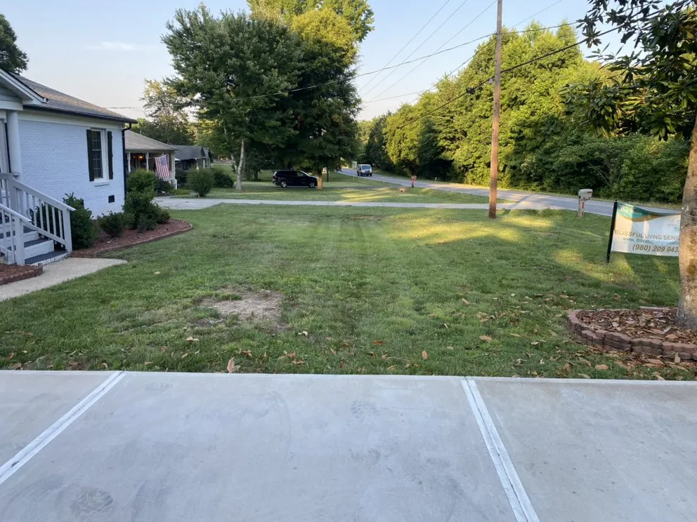 Expert lawn mowing service in Charlotte, NC by Suitable Investments