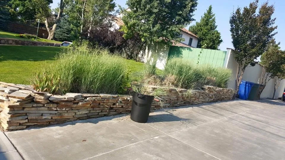 Custom landscape design with custom design in Draper, UT by Summerhays Landscaping & Maintenance