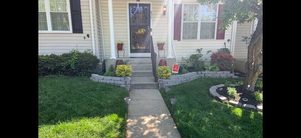 Professional yard cleanup service for homes in Denton, MD by Summertime Lawn Care