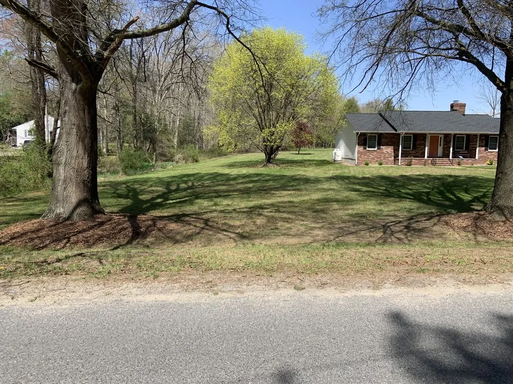 Custom yard cleanup service for year-round maintenance across Denton, MD - Summertime Lawn Care