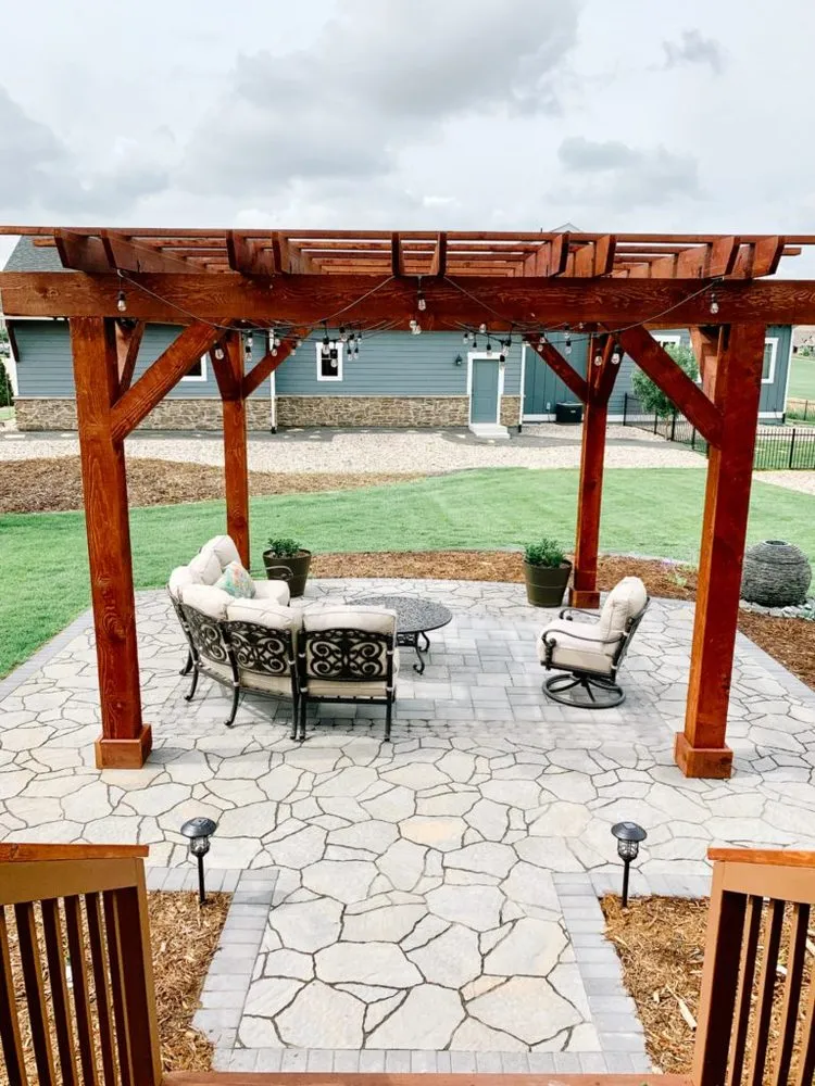 Expert lawn mowing service for year-round maintenance in Fort Collins, CO by Summit Hardscaping